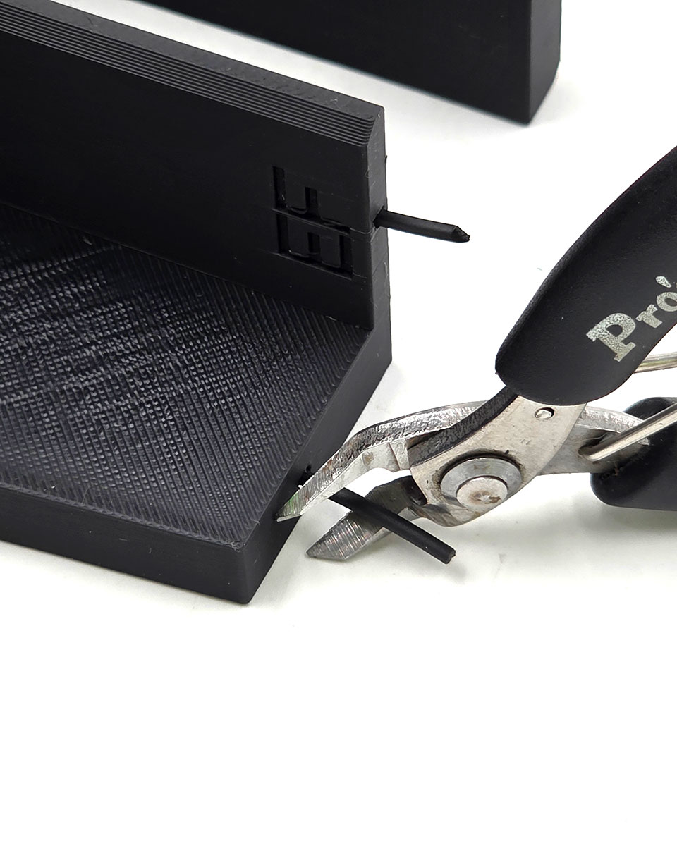 Alignment pins seated in the matching holes across a chunk seam.